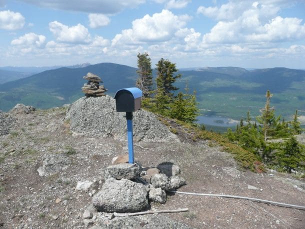 he cairn box and an inukshuk at the summit of Mt. Louie